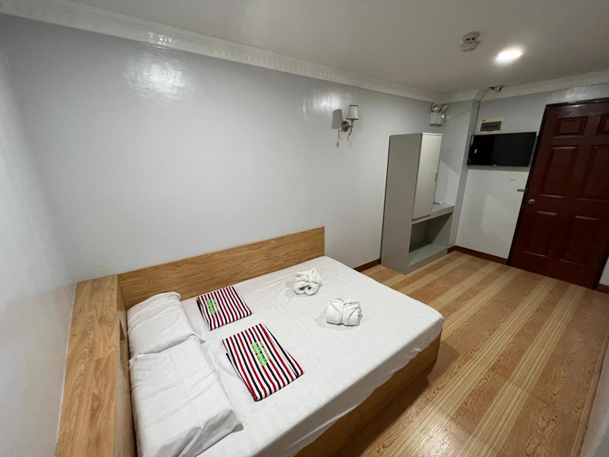 Ging-Ging Tourist Inn Badian Buitenkant foto