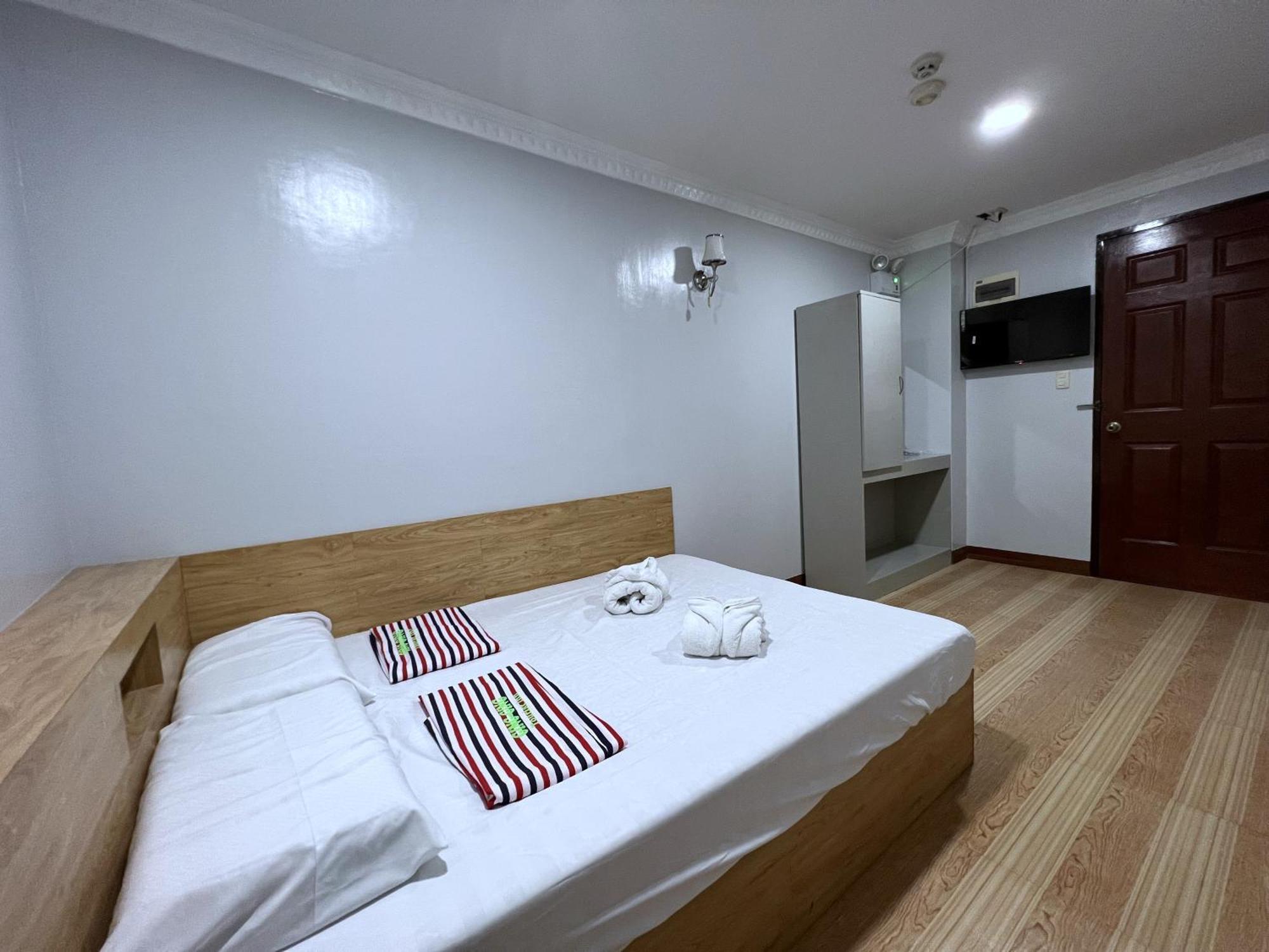 Ging-Ging Tourist Inn Badian Buitenkant foto