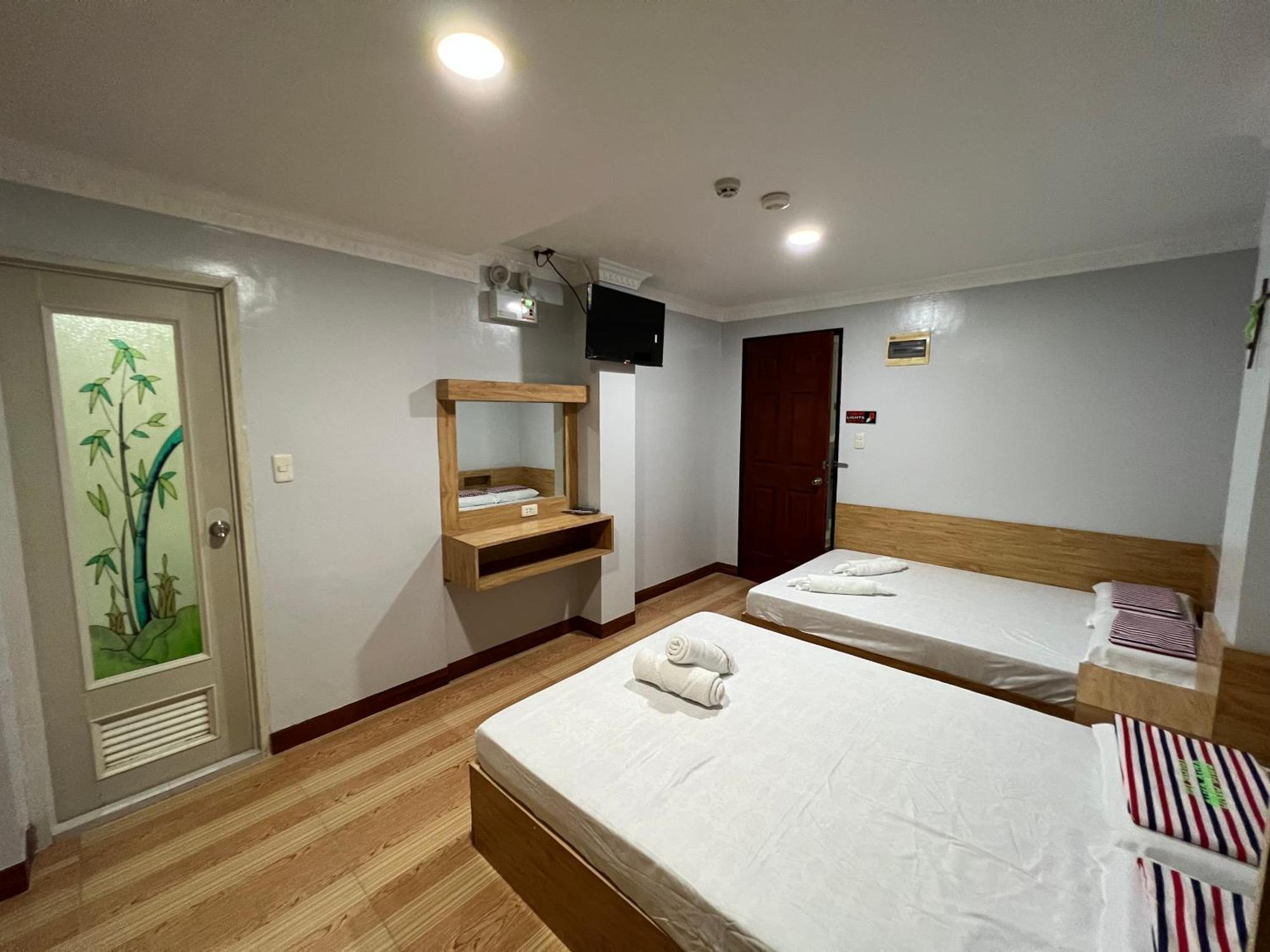 Ging-Ging Tourist Inn Badian Buitenkant foto