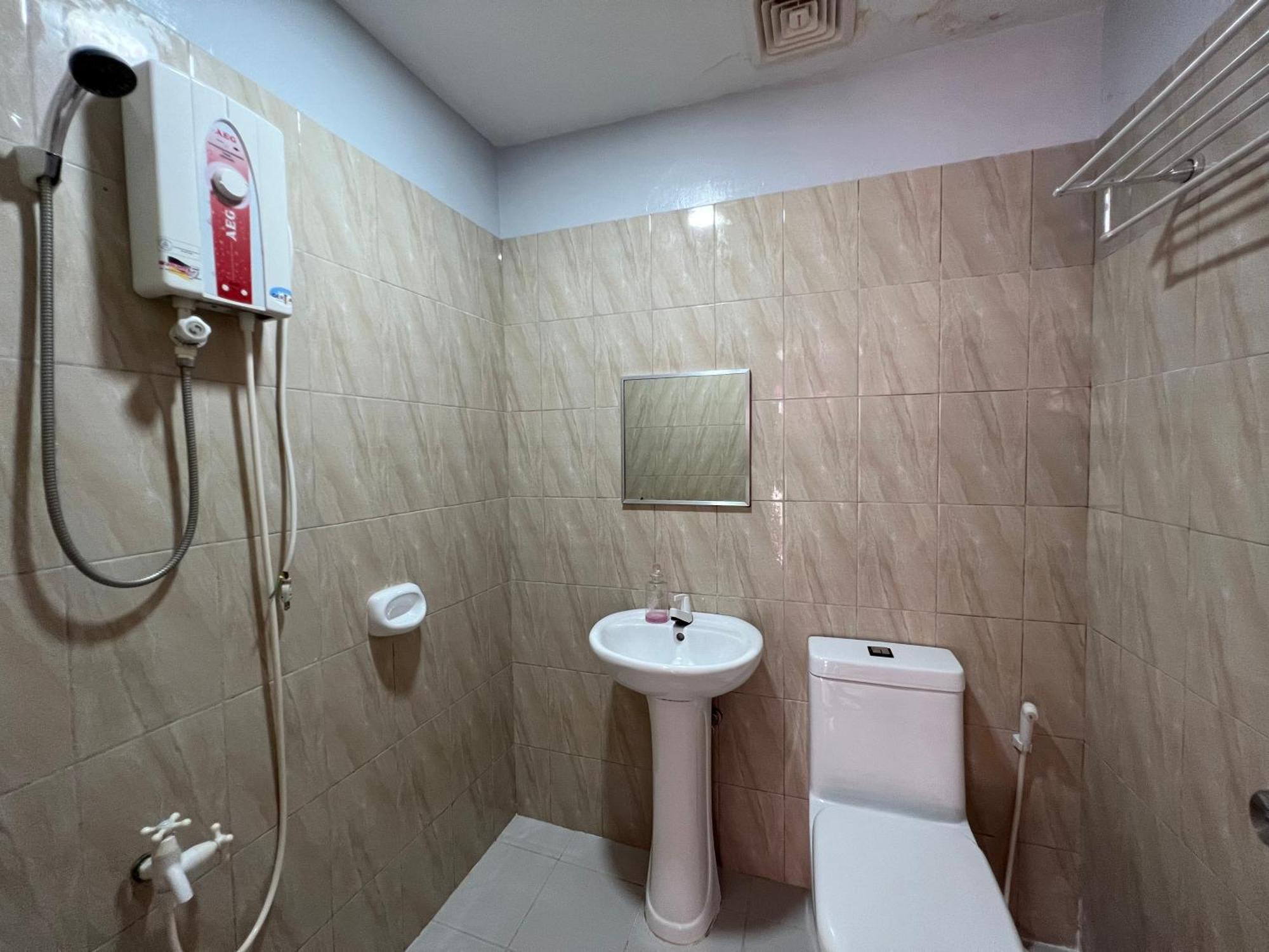 Ging-Ging Tourist Inn Badian Buitenkant foto