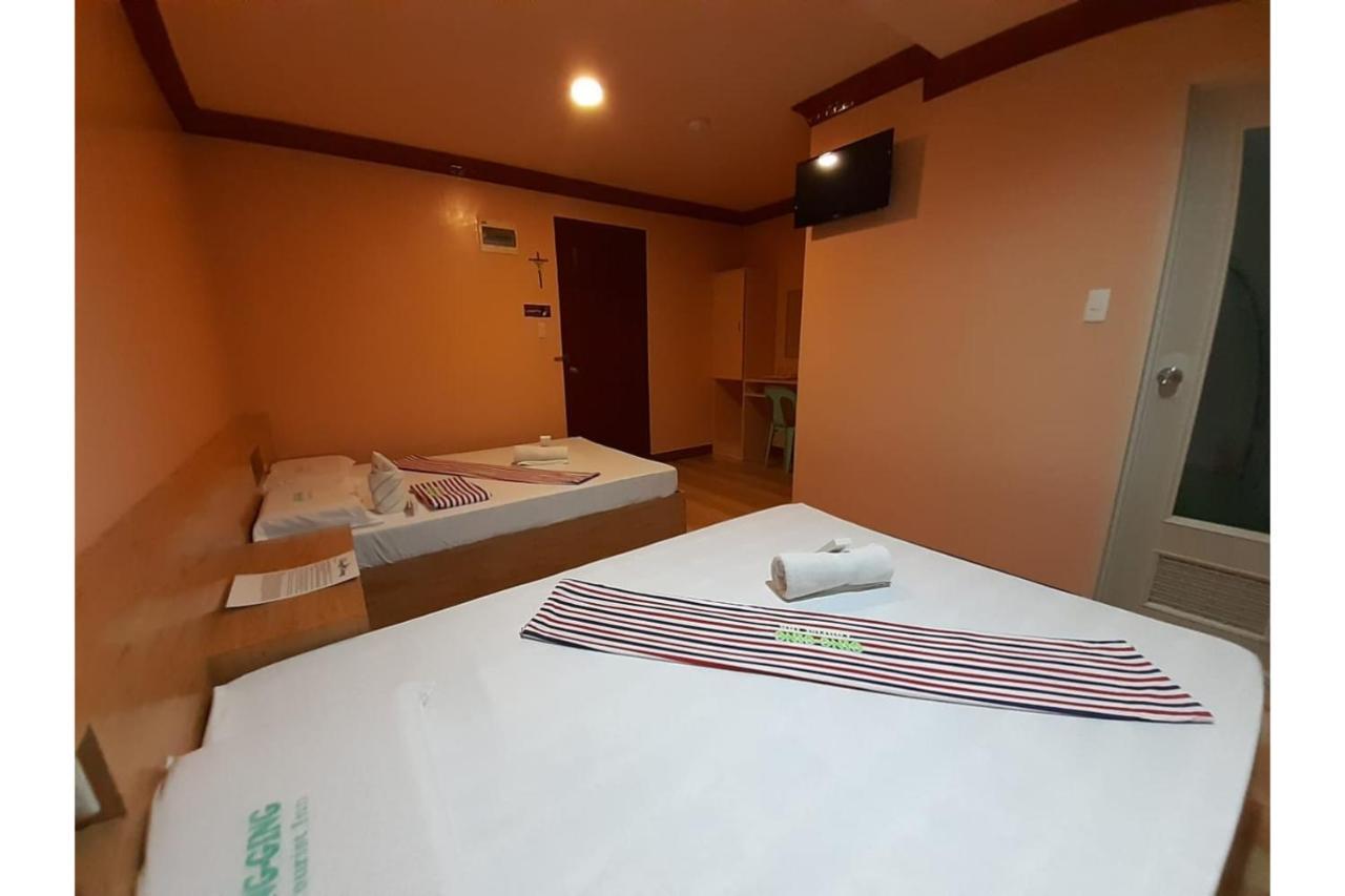 Ging-Ging Tourist Inn Badian Buitenkant foto