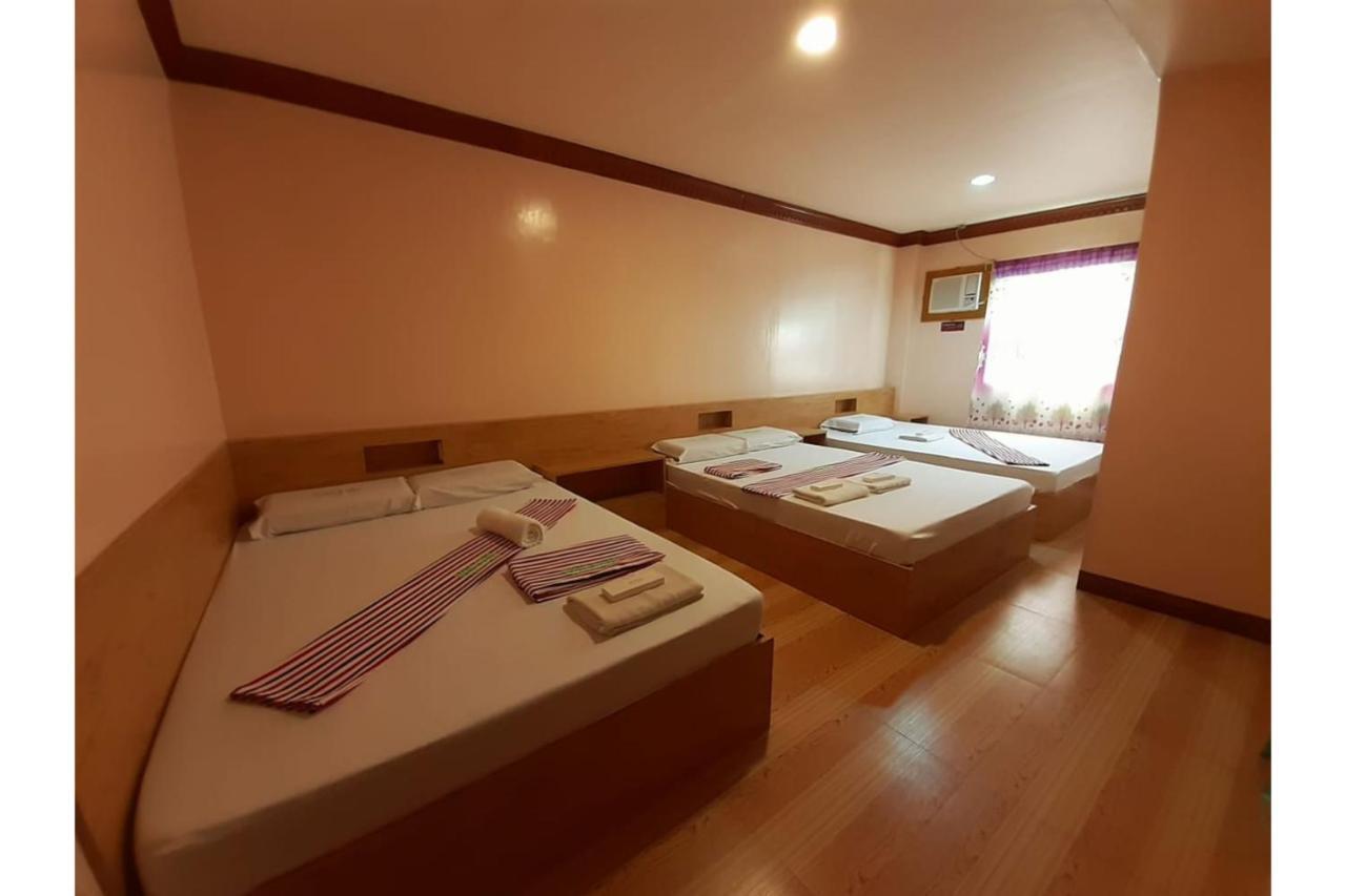 Ging-Ging Tourist Inn Badian Buitenkant foto