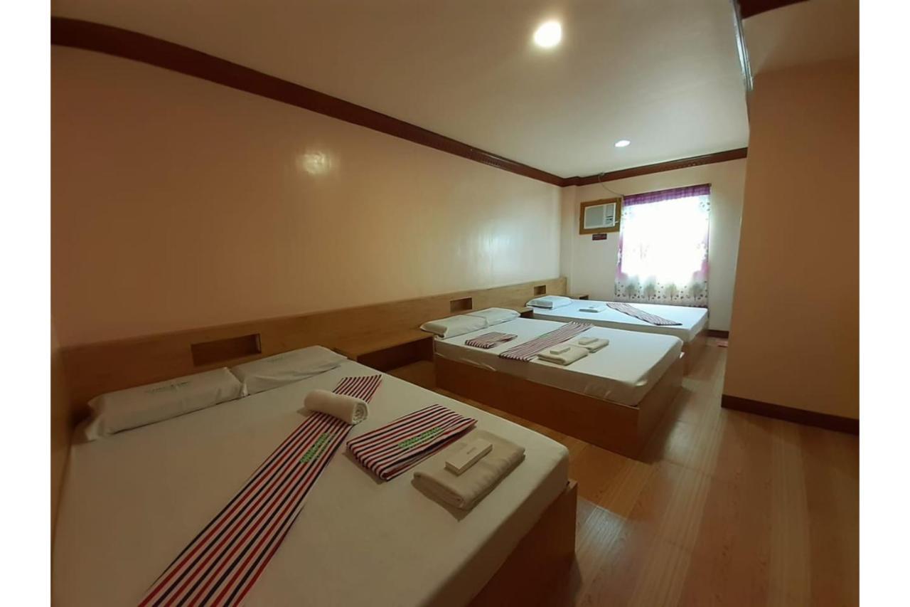 Ging-Ging Tourist Inn Badian Buitenkant foto