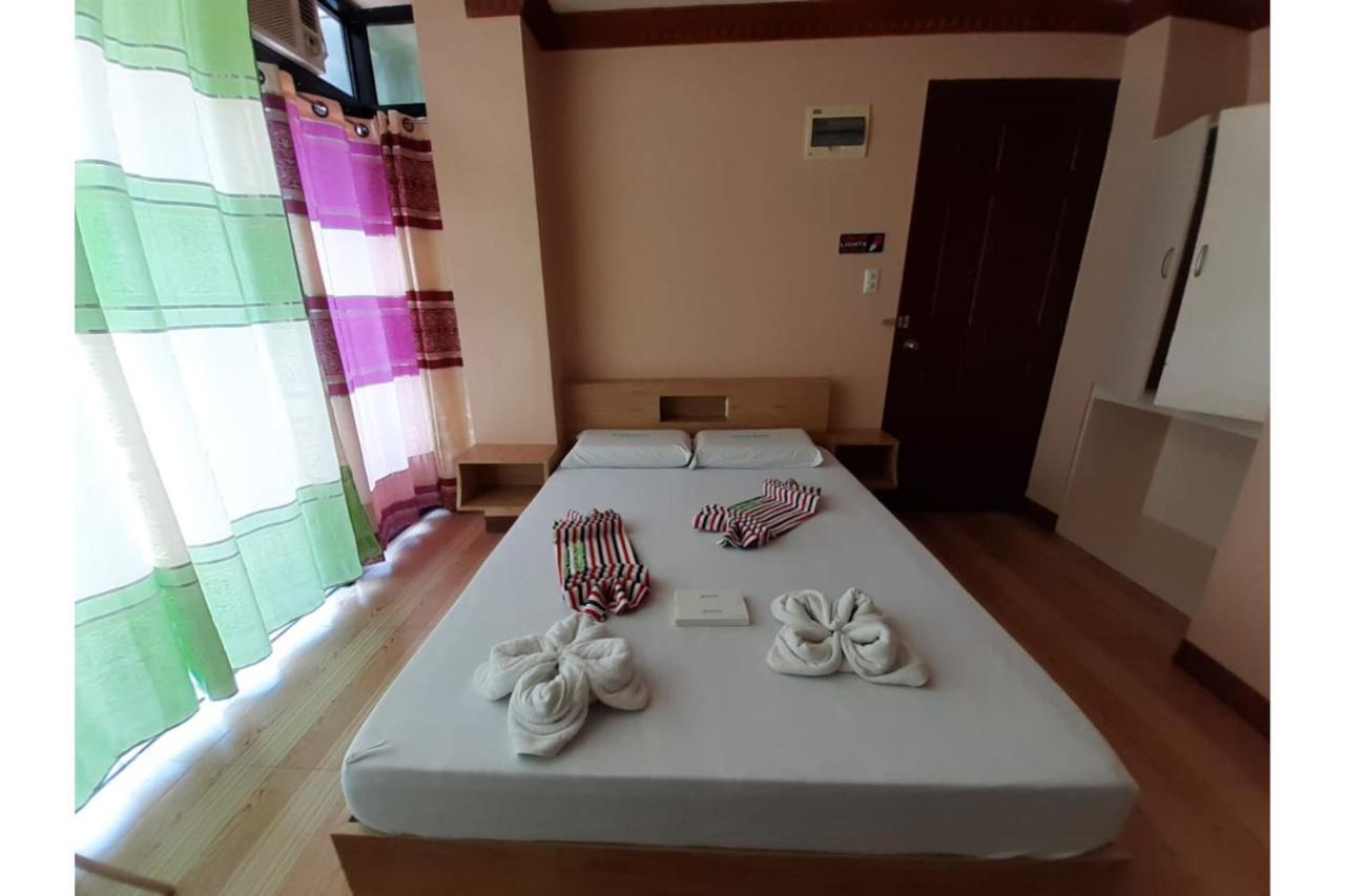 Ging-Ging Tourist Inn Badian Buitenkant foto