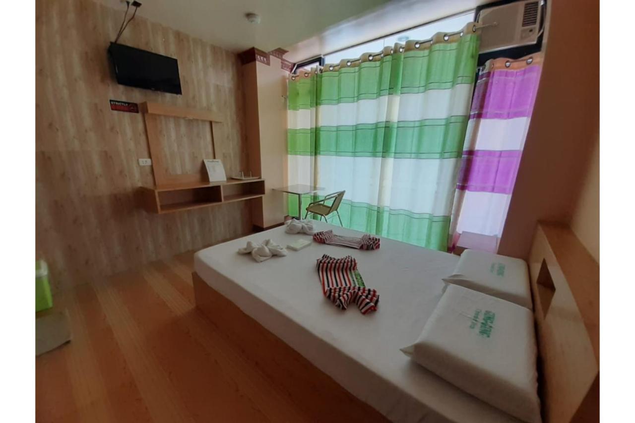 Ging-Ging Tourist Inn Badian Buitenkant foto