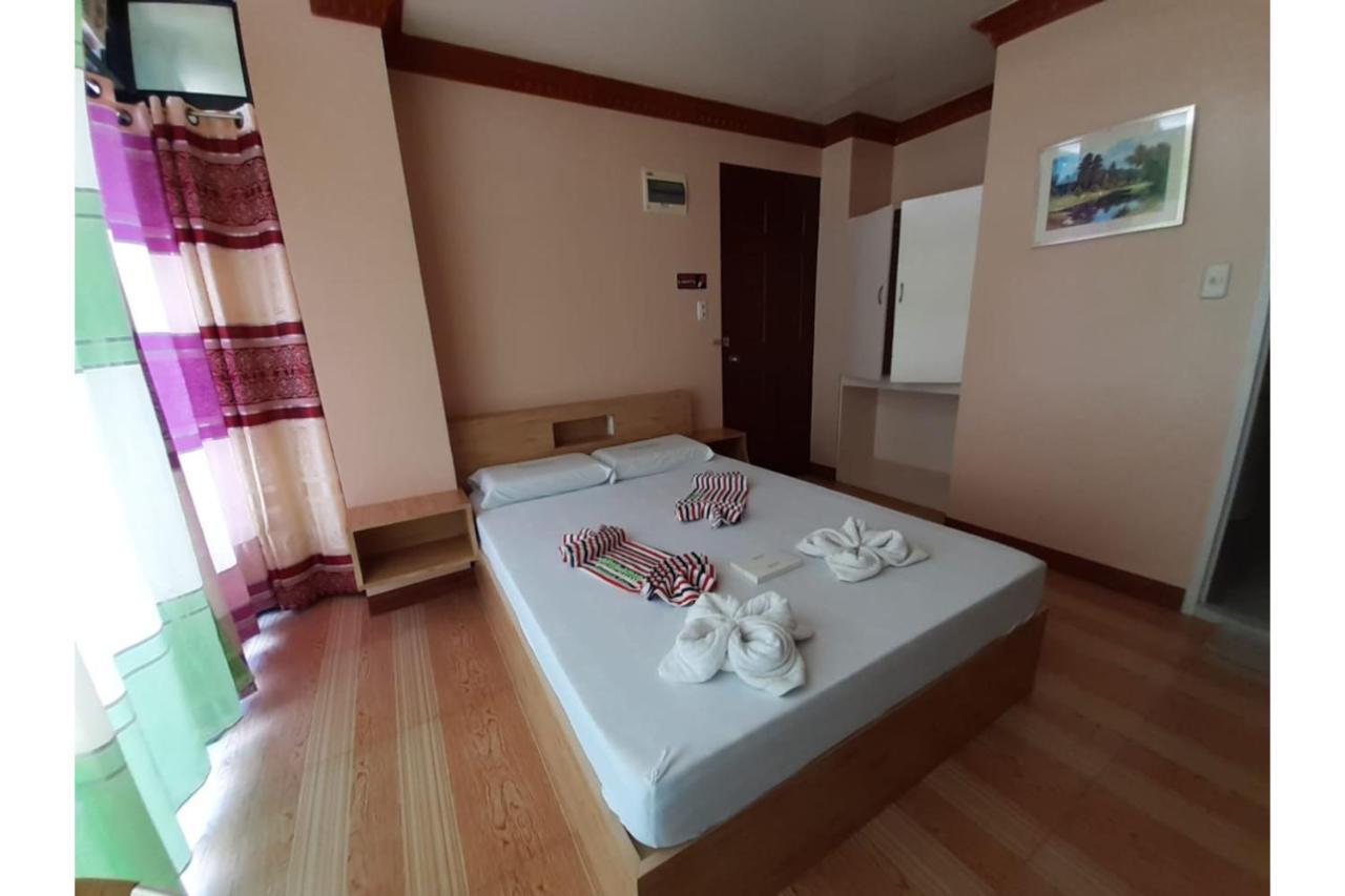 Ging-Ging Tourist Inn Badian Buitenkant foto